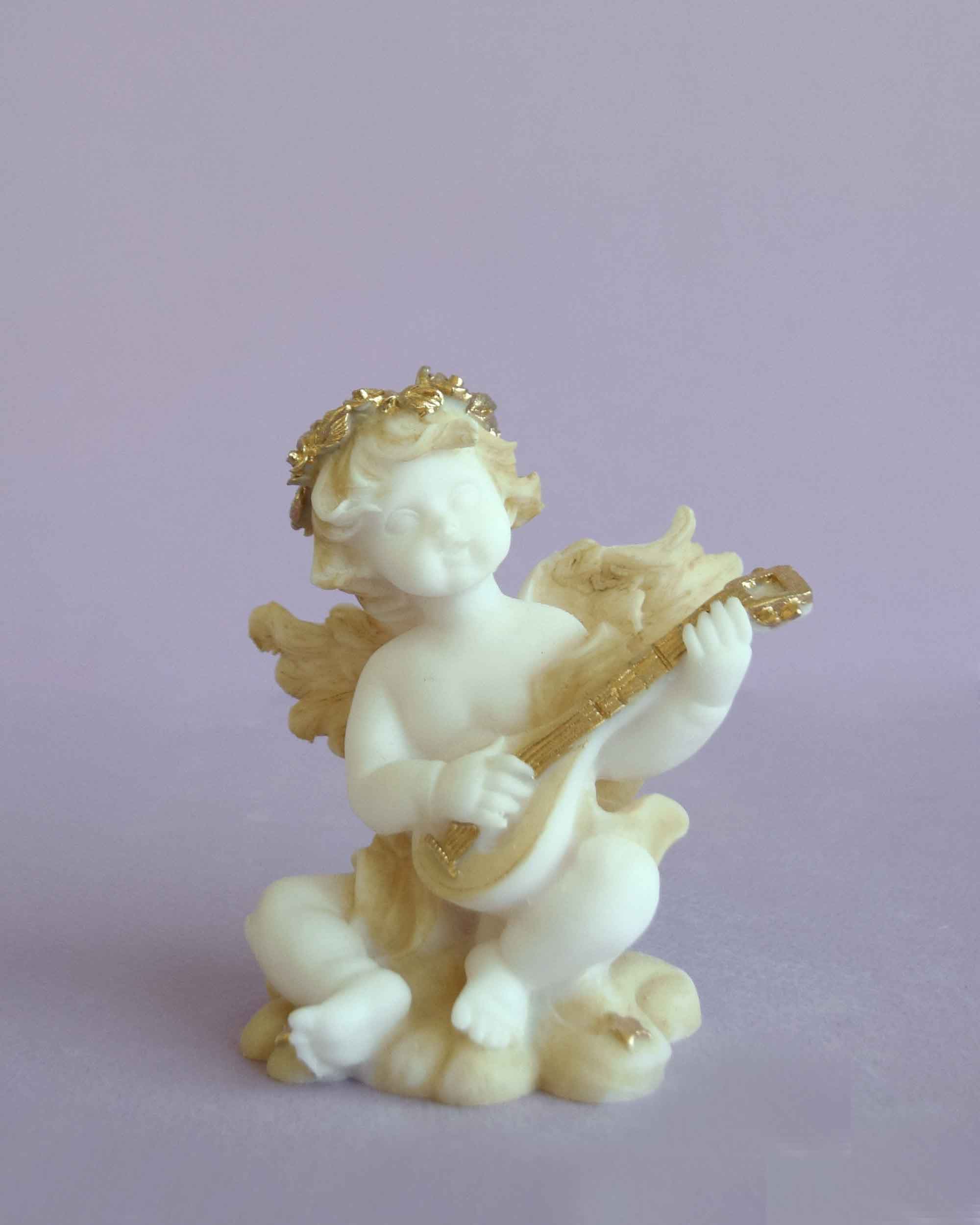 Angel playing mandolin statue