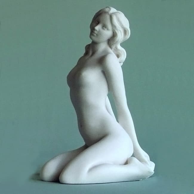 Aphrodite sits on her knees - Greek Goddess of beauty
