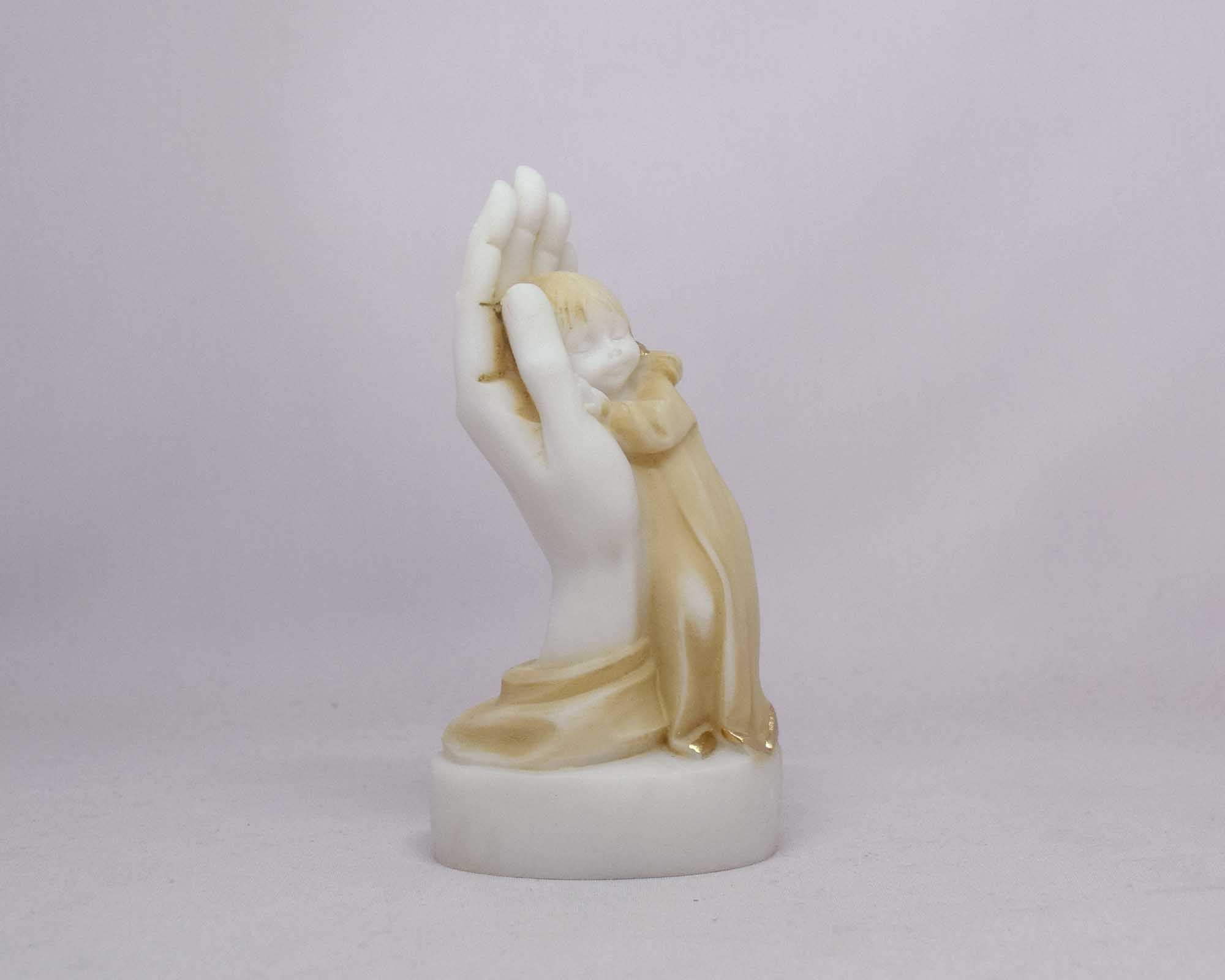 Girl in hand statue