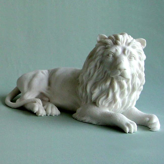 Lion lying down statue
