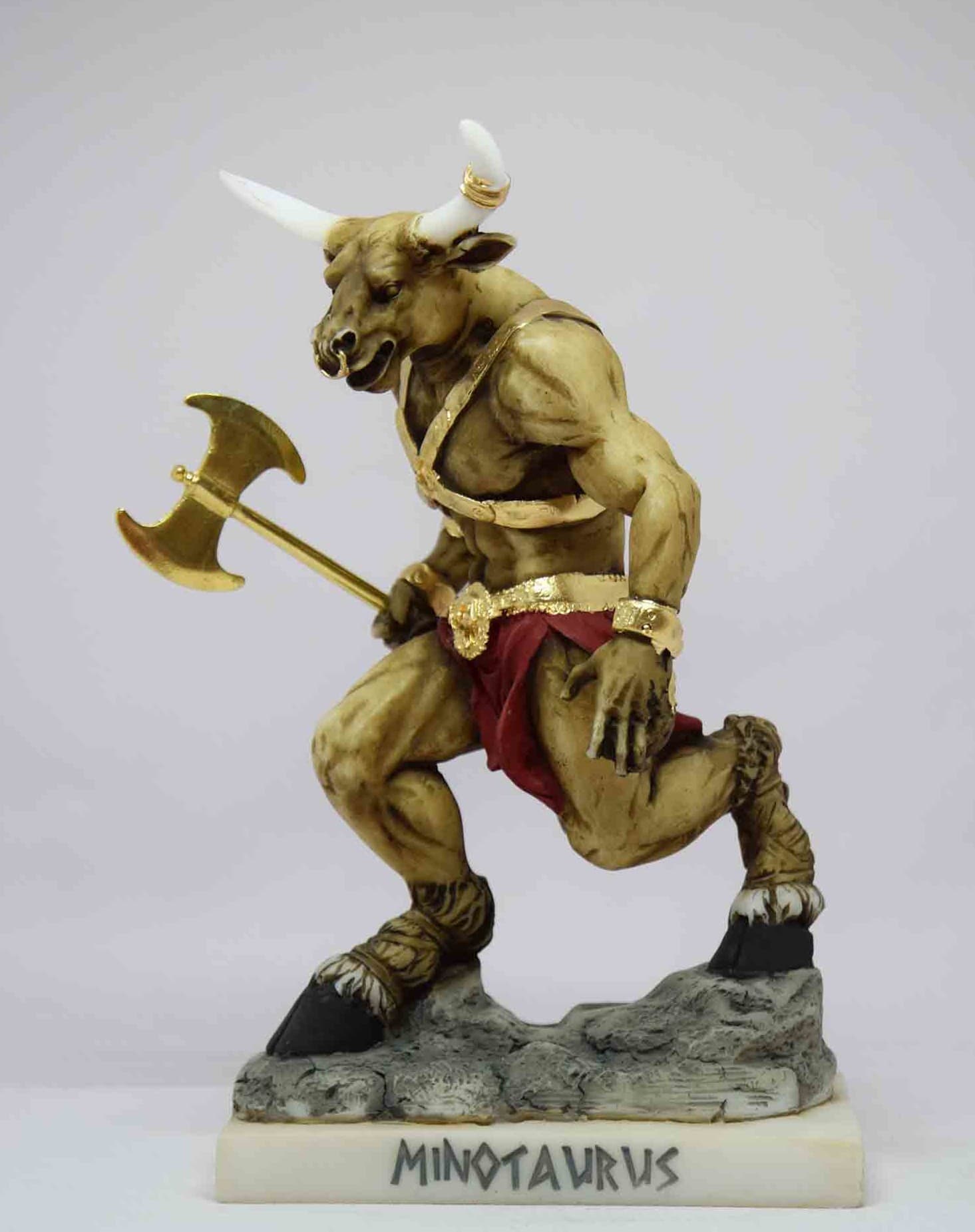 Minotaur statue holding a double-edged axe