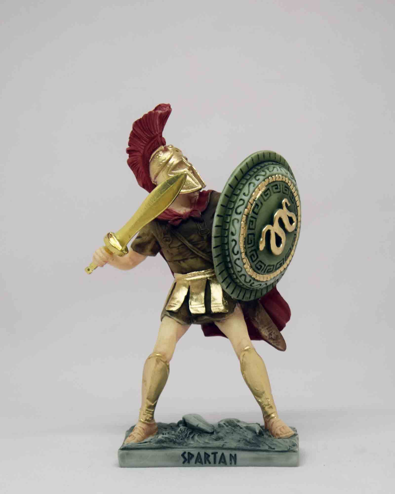 Spartan Warrior in defense holding sword and shield
