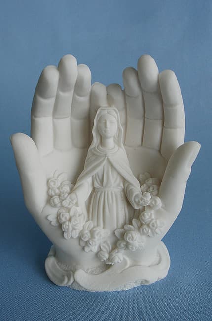 Virgin Mary inside hands