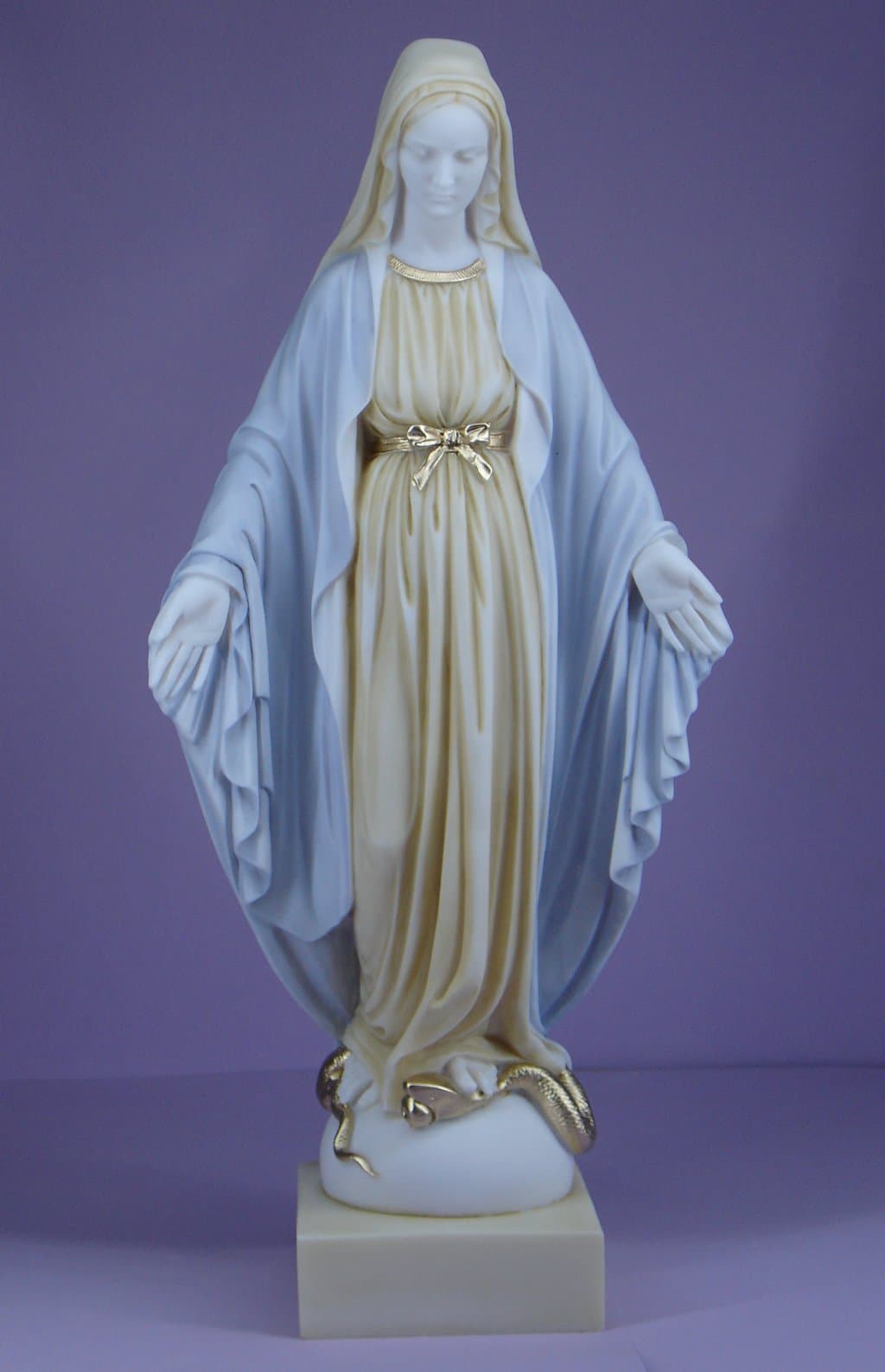 Virgin Mary steps on the snake statue