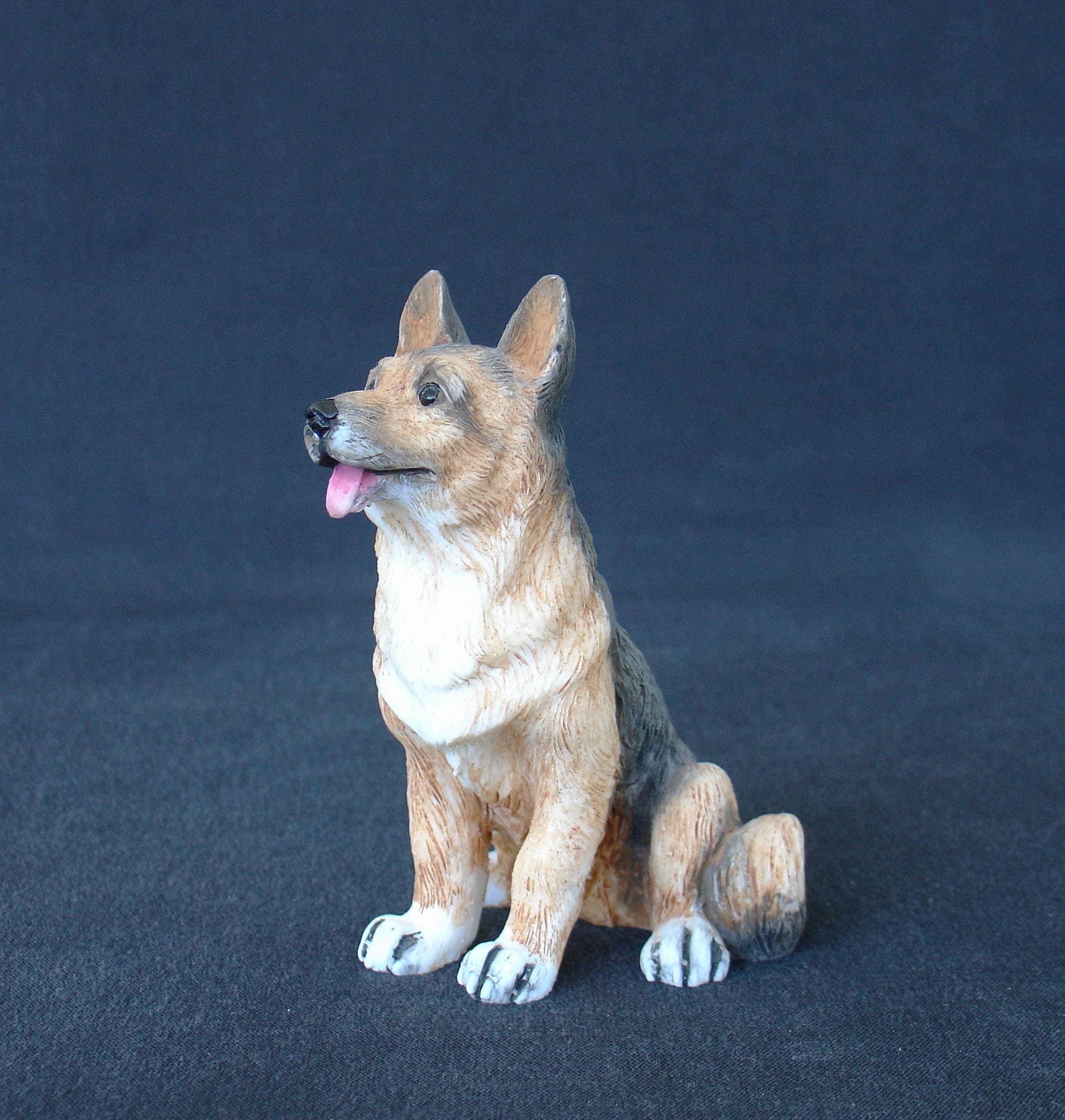 German Shepherd dog pet statue sitting on the floor